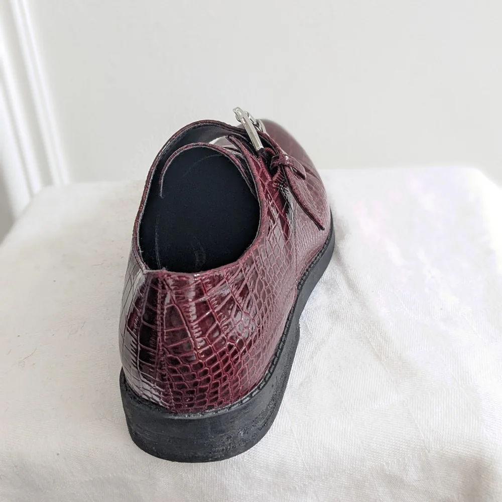 Patent leather loafers by Aldo